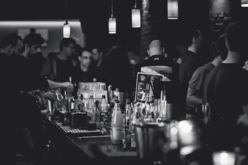 Travelers in an expat bar