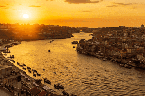 The 15 Best Places to Live in Europe - Eurotrip 2025! 18 Porto river at sunset