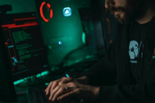 Can You Freelance in Cyber Security - Man coding